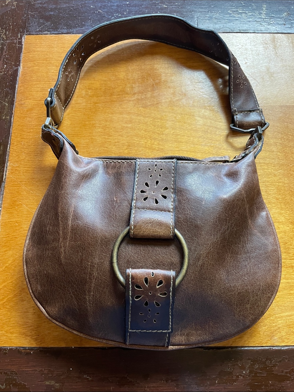 FASHION EXPRESS Brown Leather Small Shoulder Bag with cutout design.
